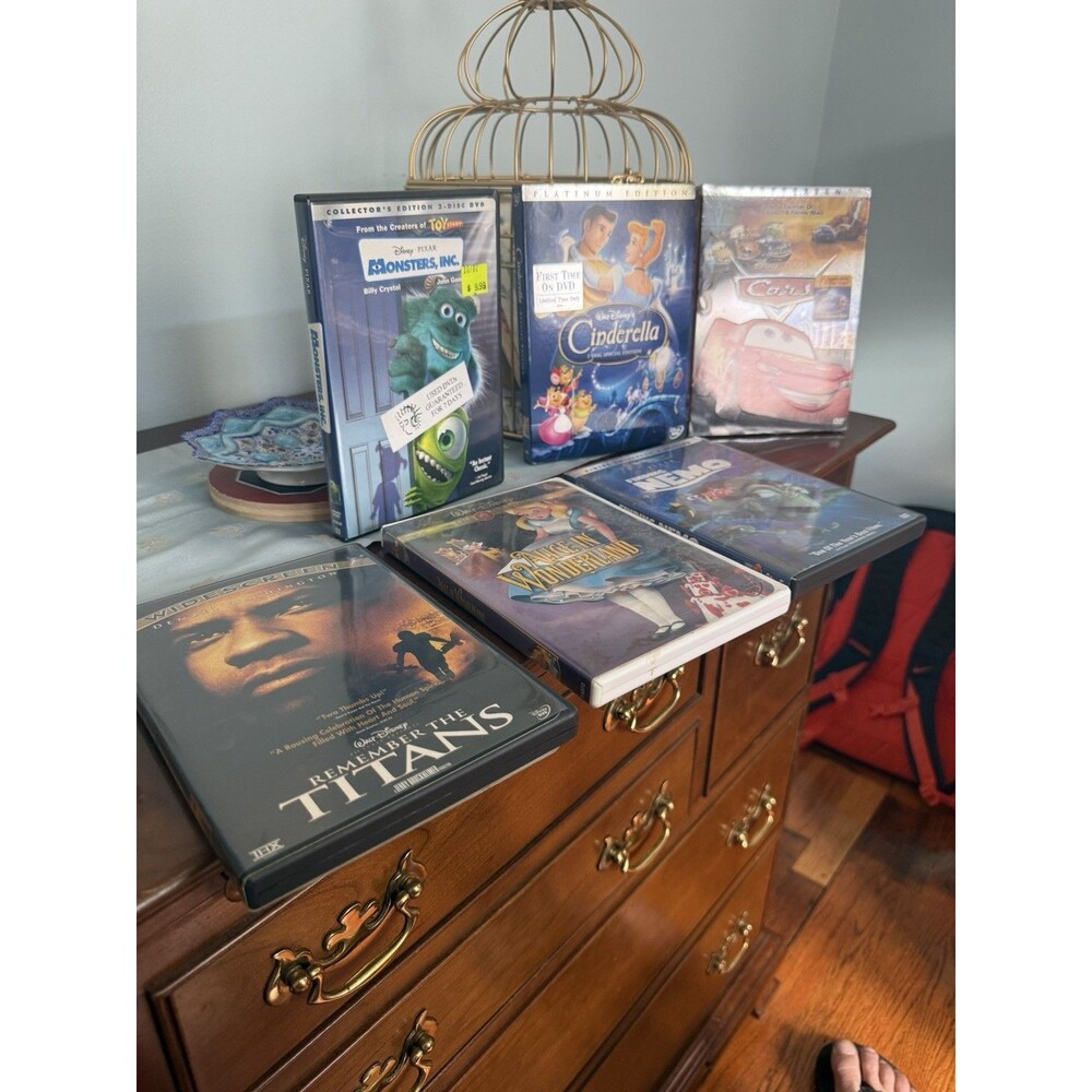 Disney's Dvds - Cars, Monsters inc, Cinderella, Finding Nemo, Alice In Wonderlan